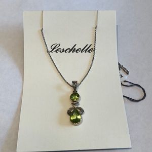 Silver and peridot drop pendant.